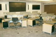 Control room utilizing PowerFlor to manage power, data and voice requirements
